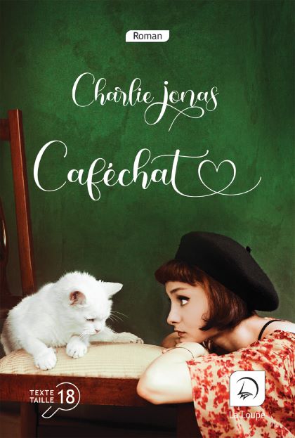 Livre écrit en caractères agrandis : "Caféchat" en édition spéciale